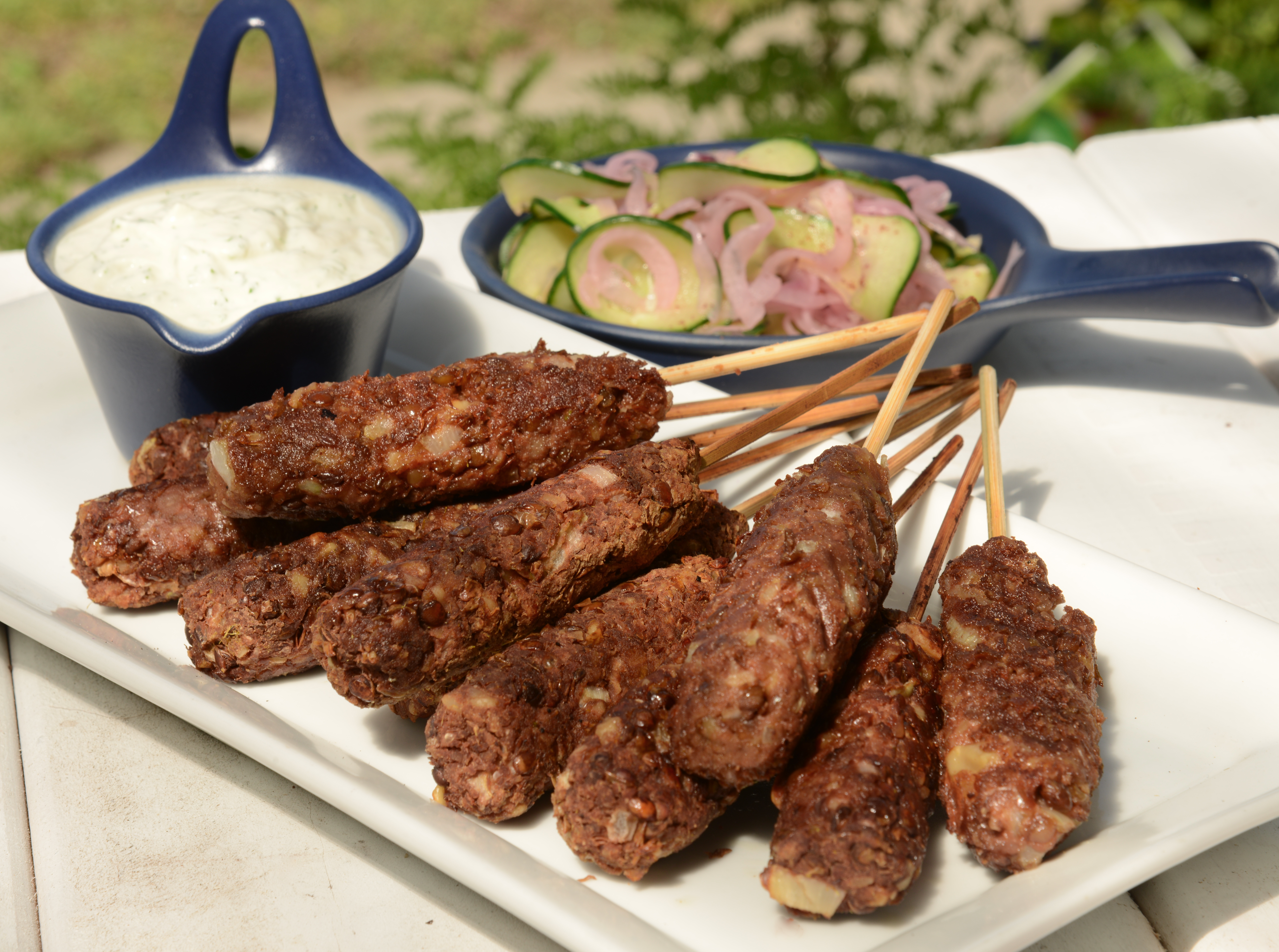 Skewers of Lentil and Walnut Kofte, pickles and dressing