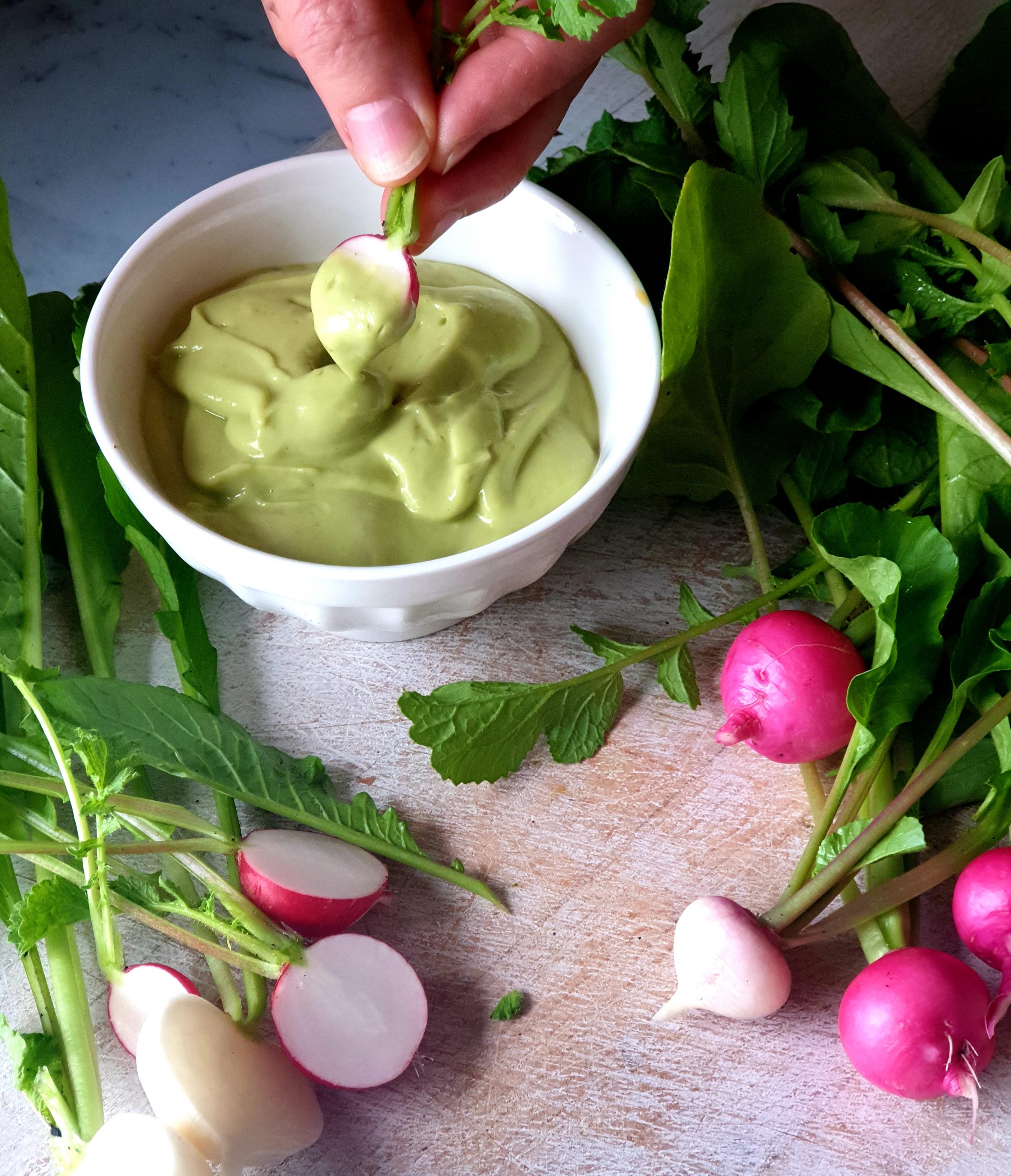 Silky avocado whip with easter egg radish erudite