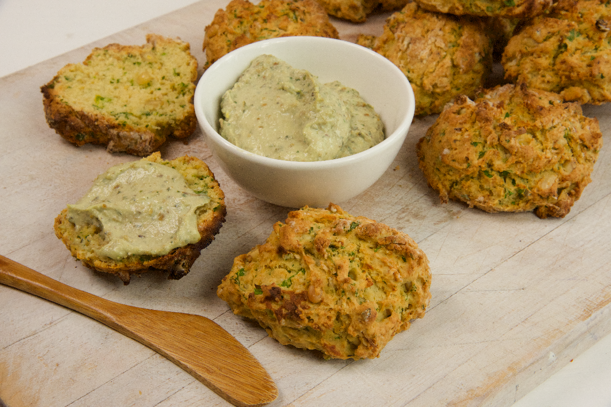 Serving board with Savoury Drop Biscuits and pesto cream cheese