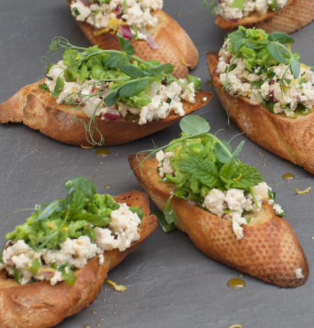 Green bean pâte on crostini with herbed tofu ricotta